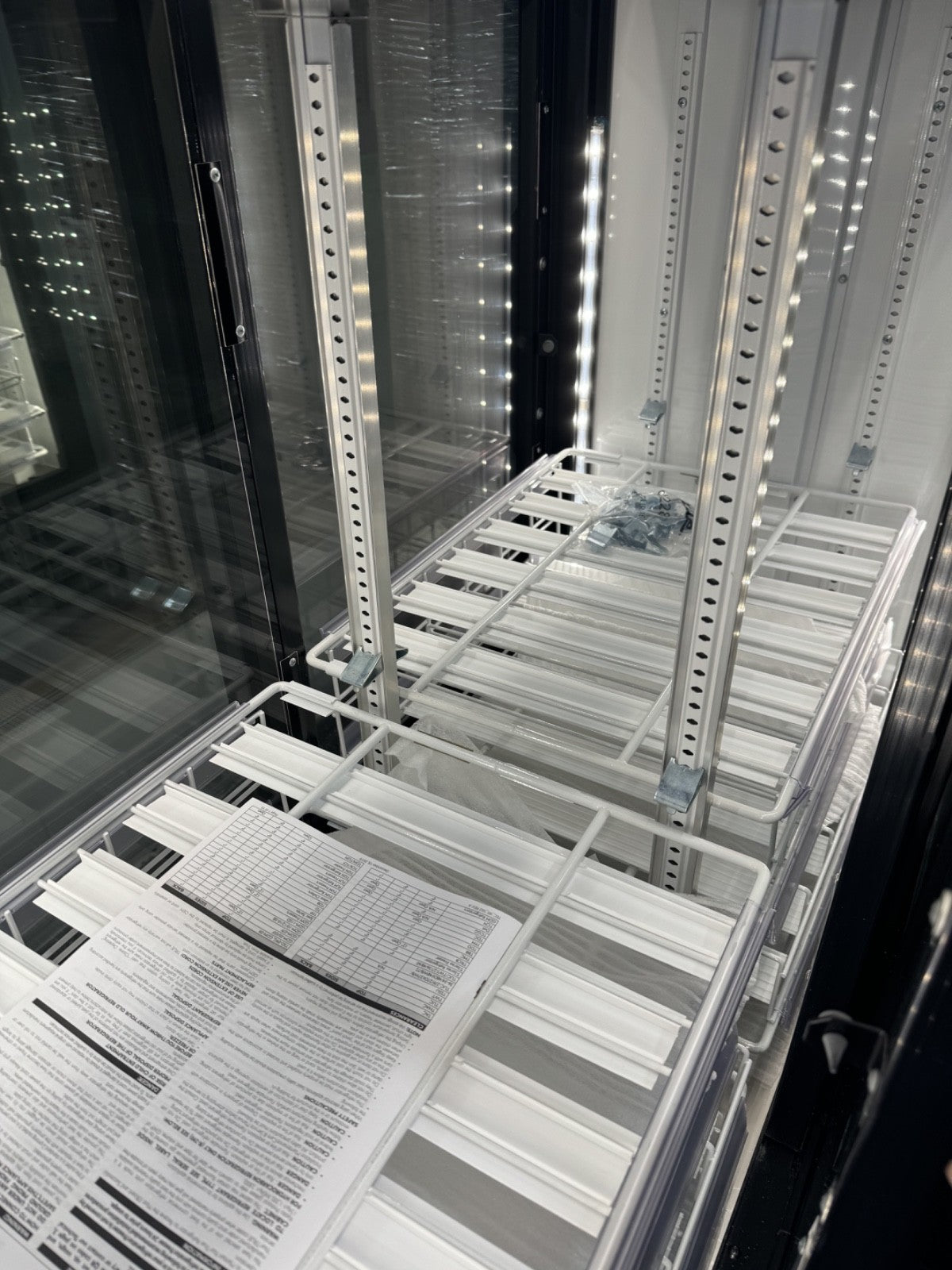 TRUE cooler GDM-41CPT-48-HC-LD 48" Two Section Pass Thru Glass Door refrigerator