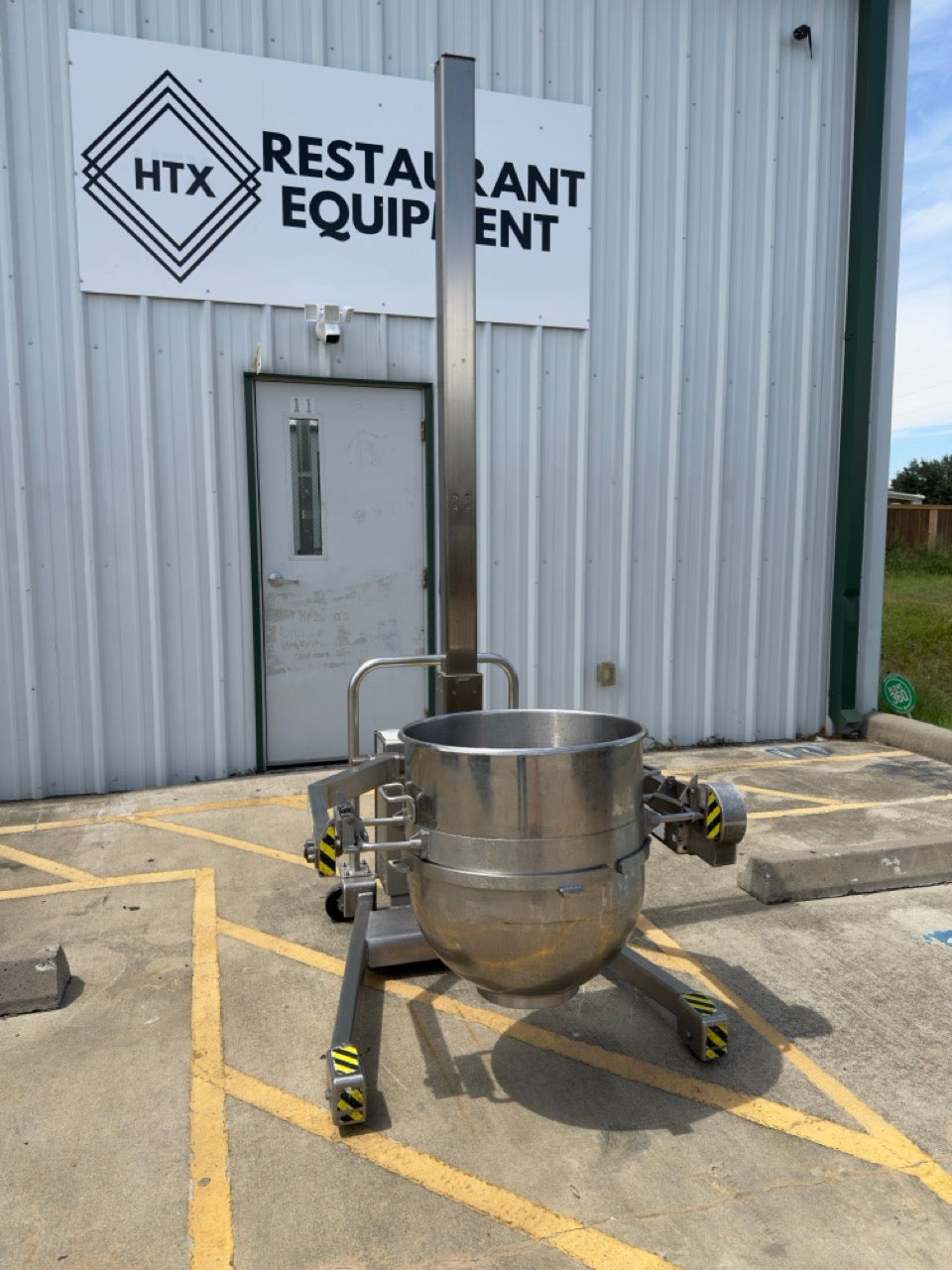 Used commercial bakery hydraulic bowl lift by Savage Bros for confectionery and food processing applications
