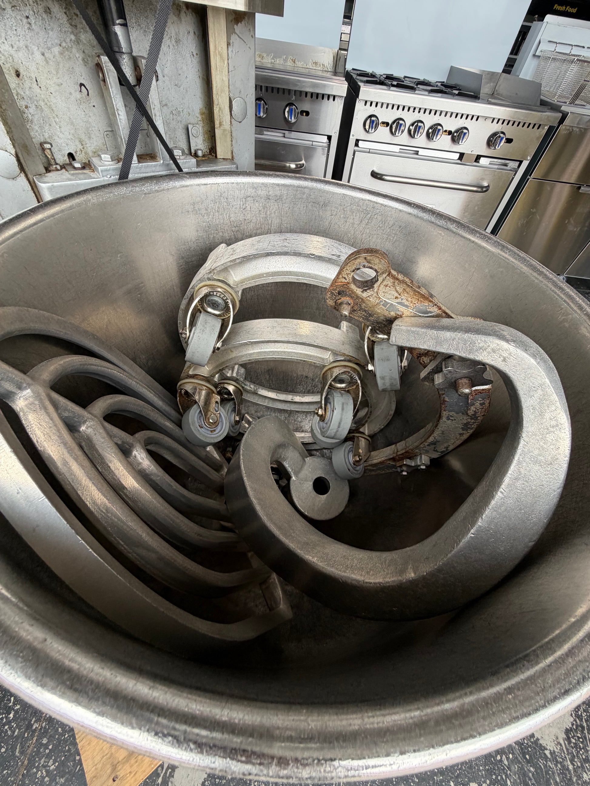Hobart HL1400N stainless steel mixer bowl with pictured commercial mixer attachments
