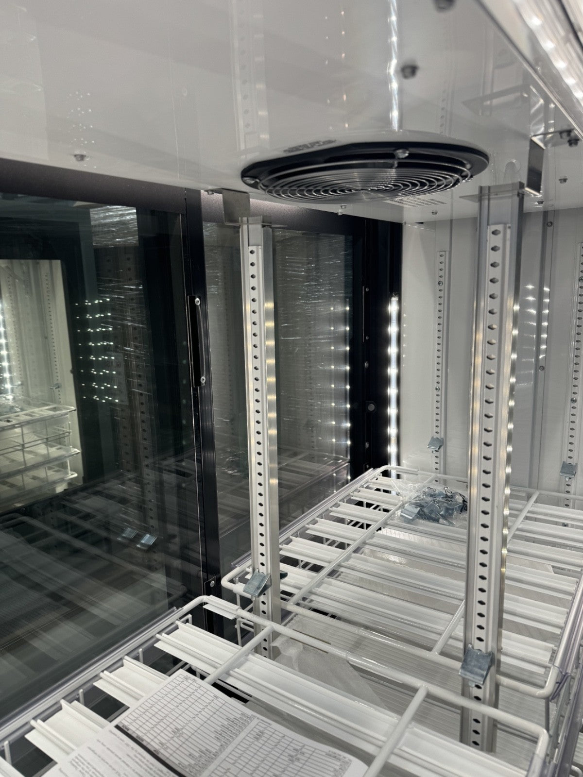 TRUE cooler GDM-41CPT-48-HC-LD 48" Two Section Pass Thru Glass Door refrigerator