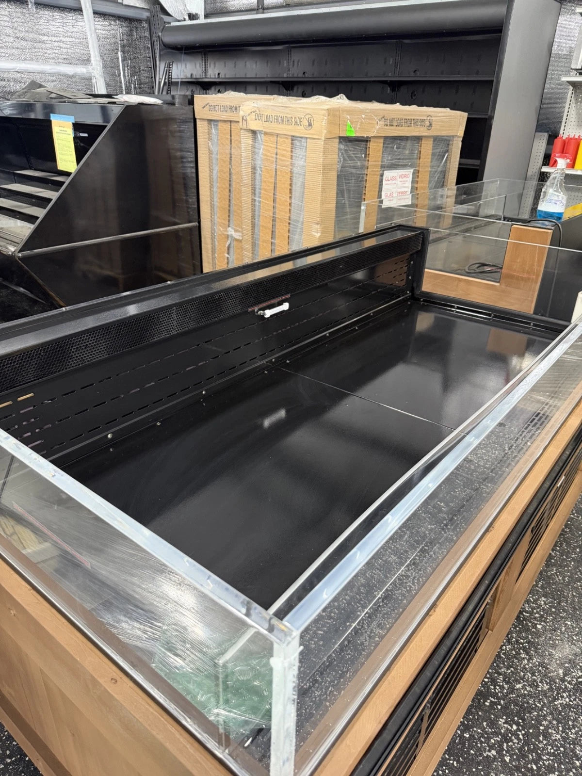 Killion mobile refrigerated display case with open merchandising area